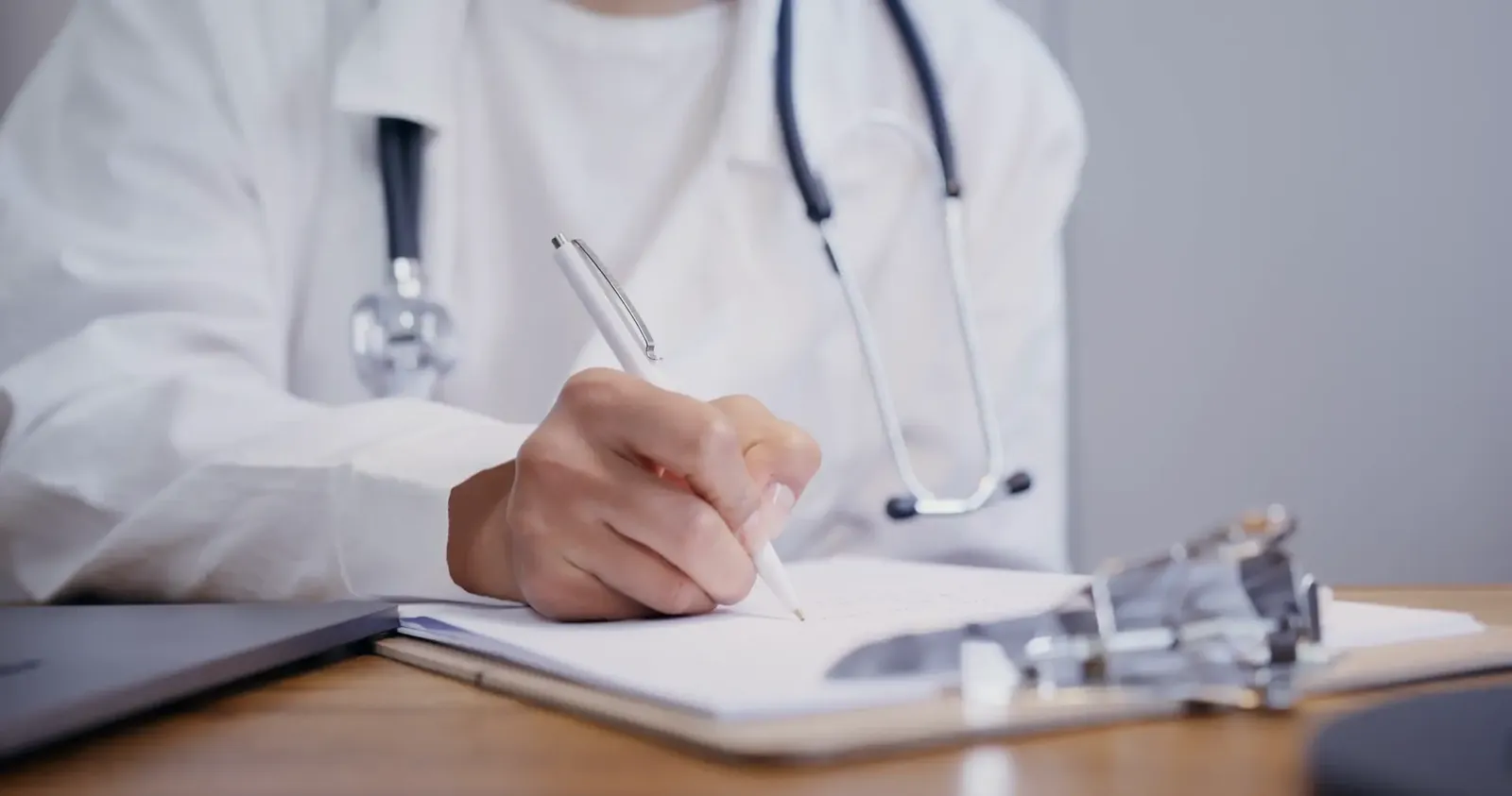 doctor taking notes